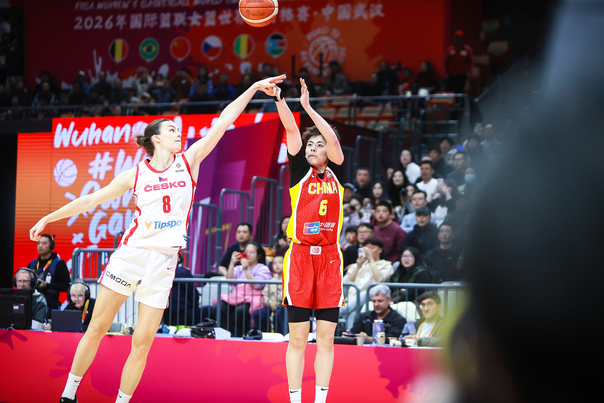 Yang Shuyu (#6) of China takes a shot against the Czech Republic in a qualifying game for the 2026 FIBA Women's Basketball World Cup in Wuhan, central China's Hubei Province, March 15, 2026. /VCG