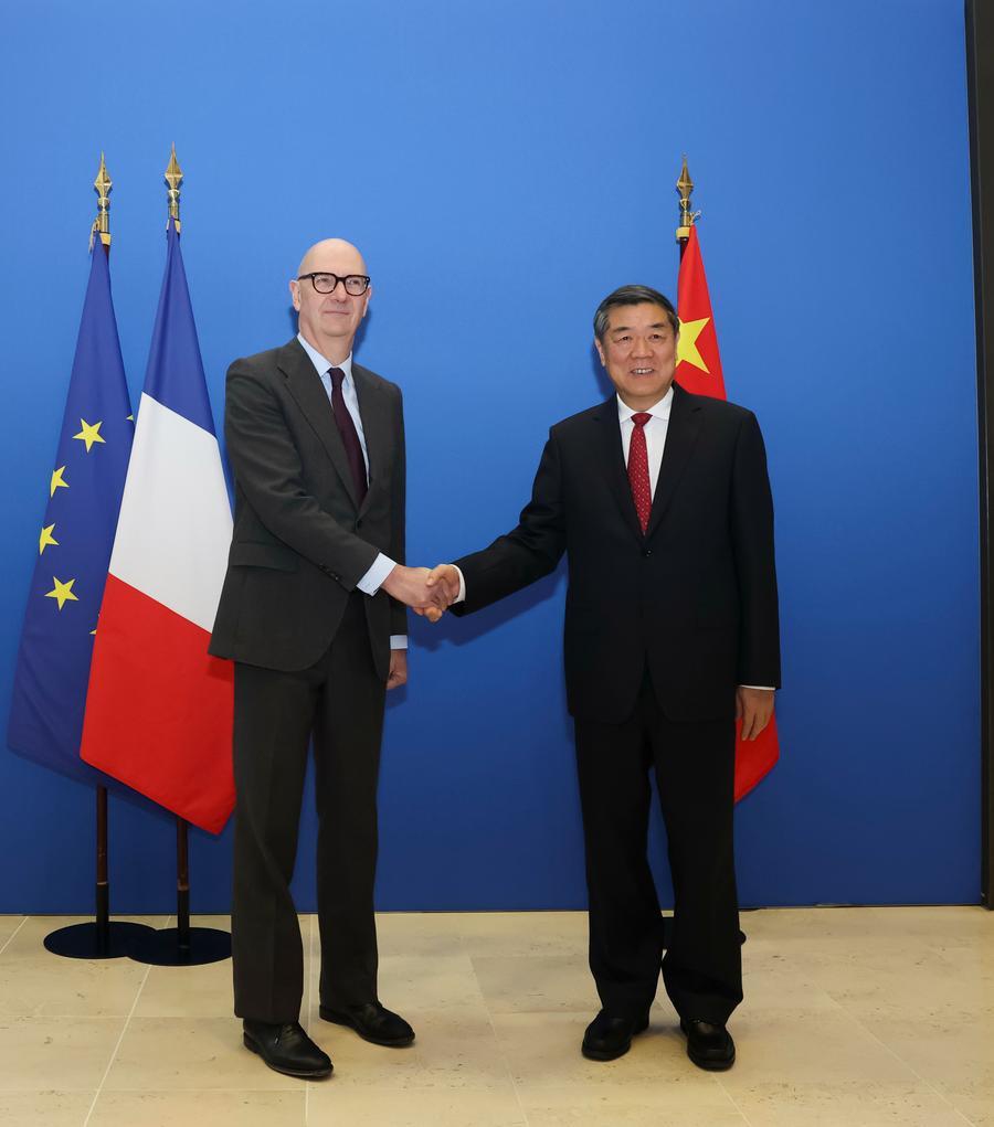 Chinese Vice Premier He Lifeng, the Chinese lead person of the China-France High-Level Economic and Financial Dialogue, shakes hands with French Finance Minister Roland Lescure, France's lead person of the dialogue, in Paris, France, on March 16, 2026. (Xinhua/Wu Huiwo)
