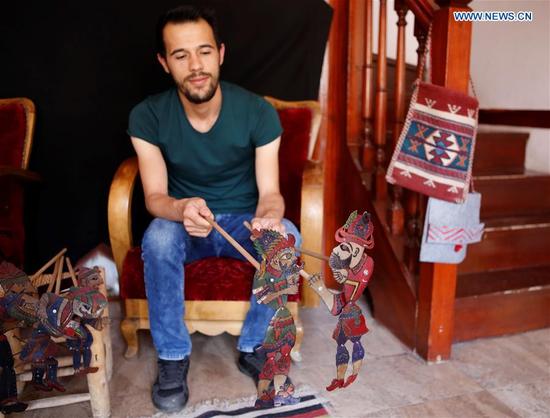 Turkish puppeteer revives Karagoz shadow play in Istanbul
