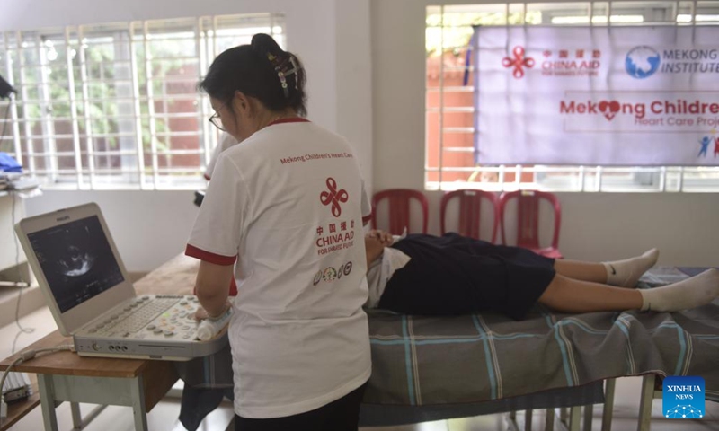 A Chinese doctor checks heart's health for a student at a primary school in Kampot, Cambodia, April 2, 2026. (Xinhua/Wu Changwei)</p><p>