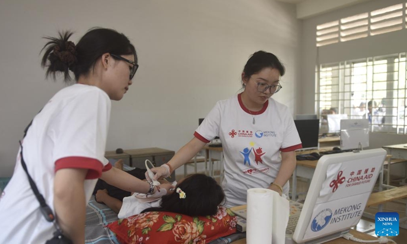 Chinese doctors check heart's health for a student at a primary school in Kampot, Cambodia, April 2, 2026. (Xinhua/Wu Changwei)</p><p>