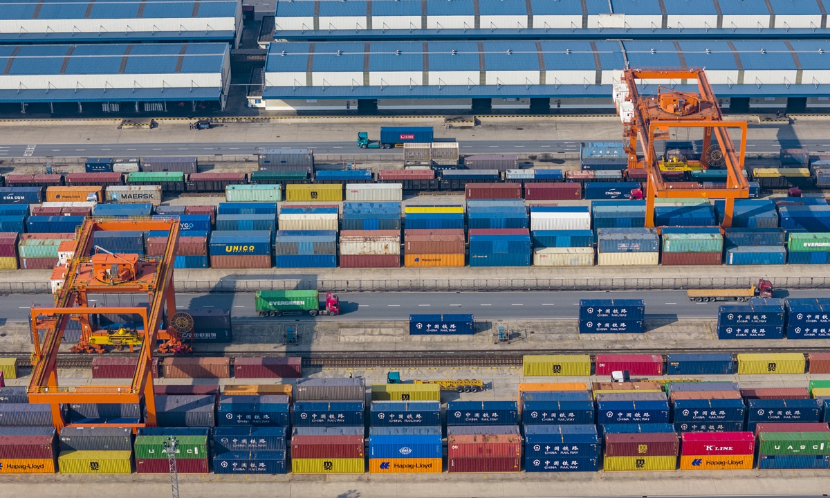 Trucks and cranes are busy with container loading operations at a train depot in Jinhua, East China's Zhejiang Province, on February 8, 2026. According to statistics from the Hangzhou railway logistics center, the number of China-Europe freight trains moving in and out of Zhejiang reached 346 in January, a year-on-year increase of 13.1 percent. Photo: VCG