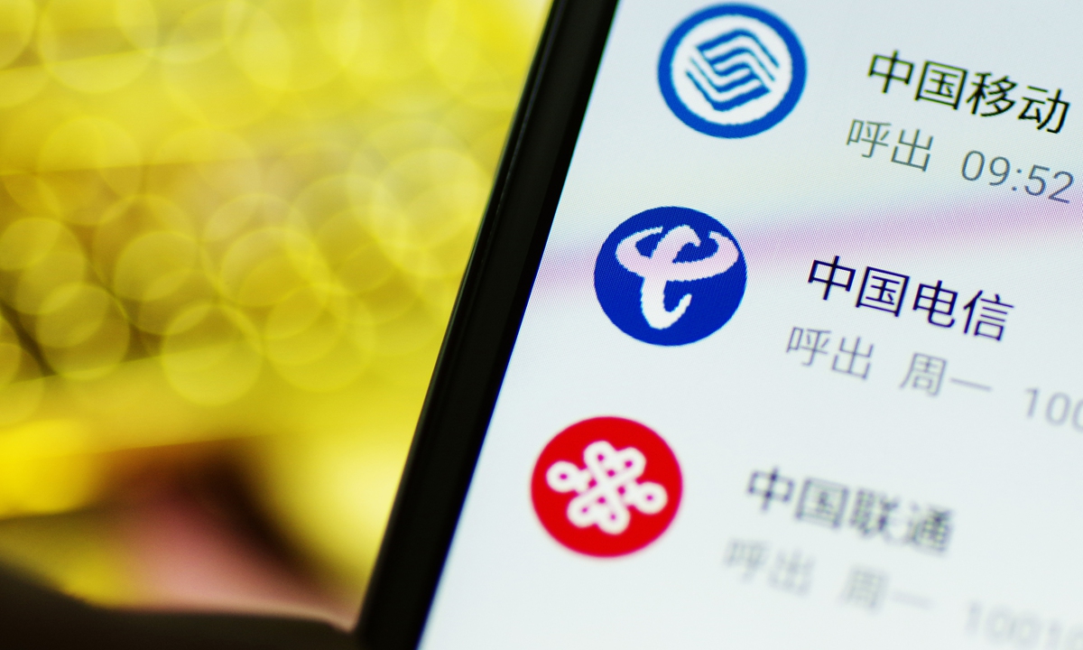 A smartphone screen displays call records featuring China's three major telecom operators - China Mobile, China Telecom and China Unicom. Photo: VCG