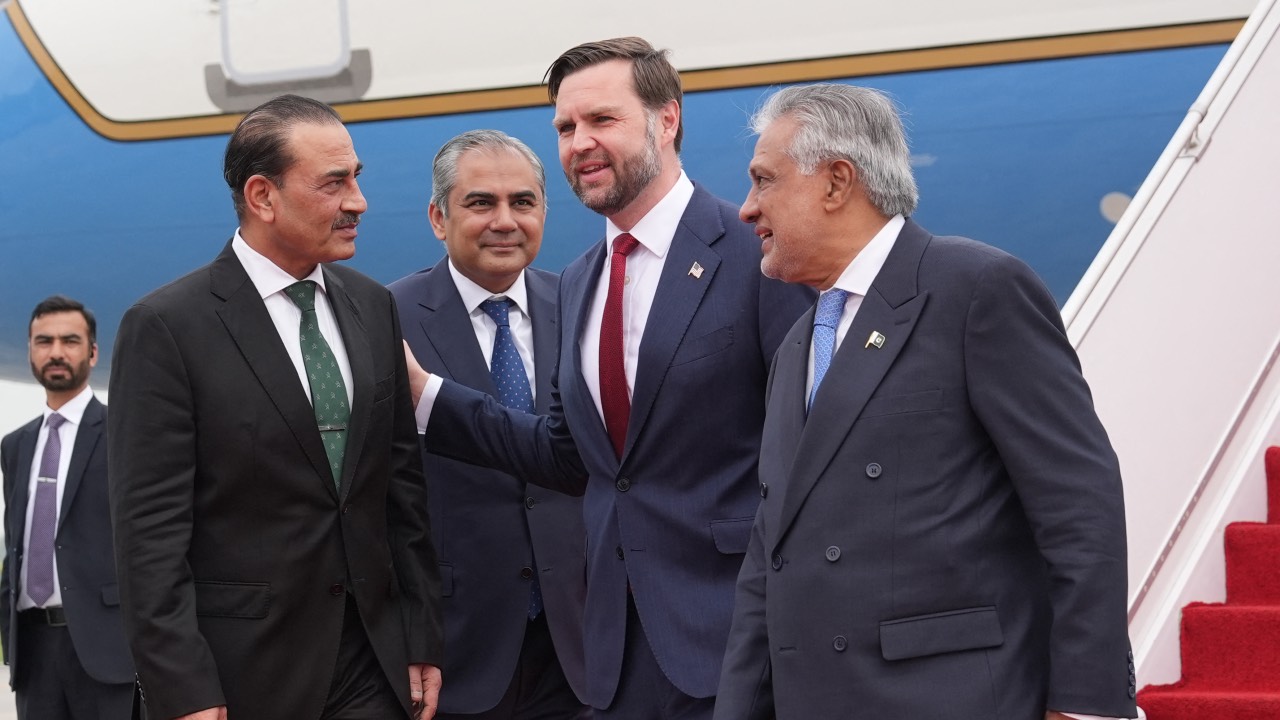 US Vice President JD Vance (2nd-R) talks with Pakistan's Chief of Army Staff Field Marshall Asim Munir (L), after arriving for talks with Iranian officials in Islamabad. /Jacquelyn Martin/AFP
