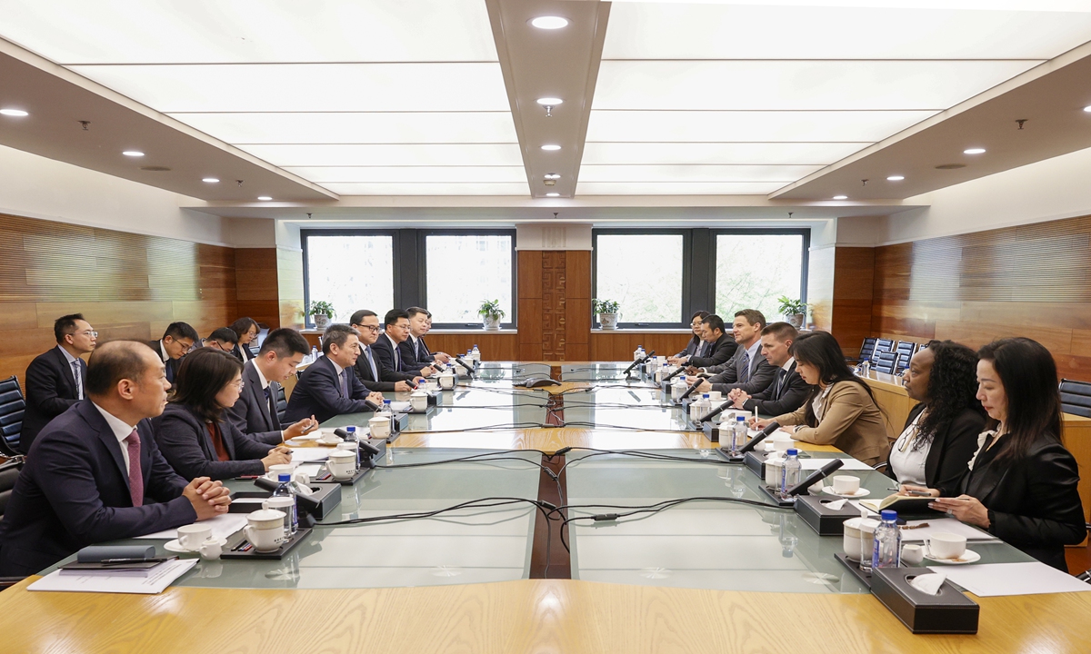 Li Chenggang, China international trade representative with the Ministry of Commerce and vice minister of commerce, meets with Steven Croley, Executive Vice President and Chief Policy Officer of Ford Motor Company, in Beijing on April 13, 2026. Photo: screenshot of Ministry of Commerce's website