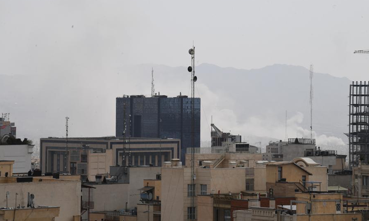 This photo taken on Feb. 28, 2026 shows thick smoke rising in downtown Tehran, Iran. Photo: Xinhua