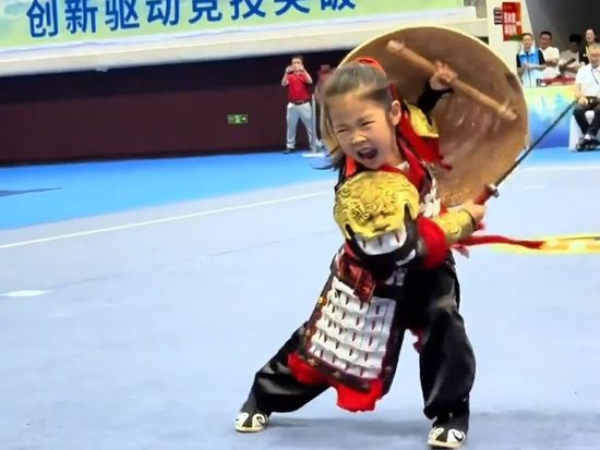 Mini martial artist wields sword with precision