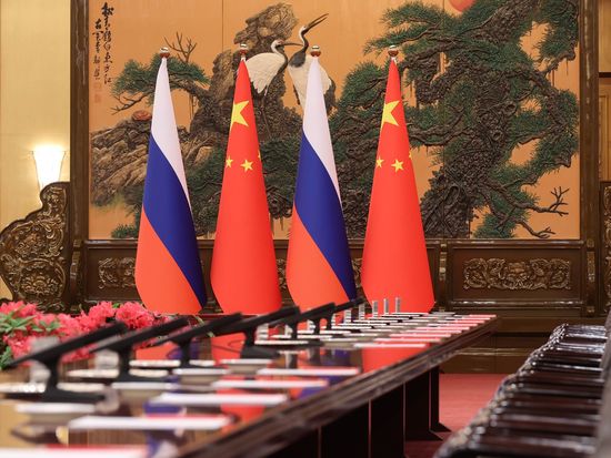 Xi holds talks with Putin in Beijing