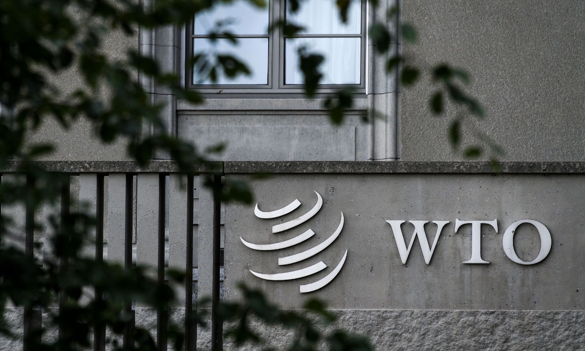A sign of the WTO on its headquarters in Geneva Photo: VCG