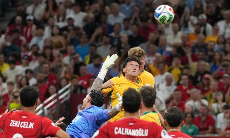 Alessandro Circati (top L) of Australia fights for the head ball during the group D match between Australia and Türkiye at the 2026 FIFA World Cup at BC Place Vancouver in Vancouver, Canada, June 13, 2026. (Xinhua/Meng Yongmin)