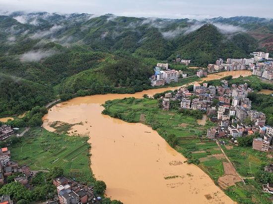 China raises flood control emergency response for Guangdong, Guangxi