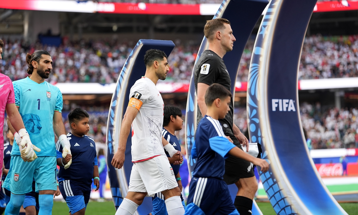 Iran and New Zealand teams enter the field during the 2026 FIFA World Cup First Stage Group G match between IR Iran and New Zealand at the Los Angeles Stadium (SoFi Stadium) in Inglewood, California, United States on June 15, 2026. Photo:VCG