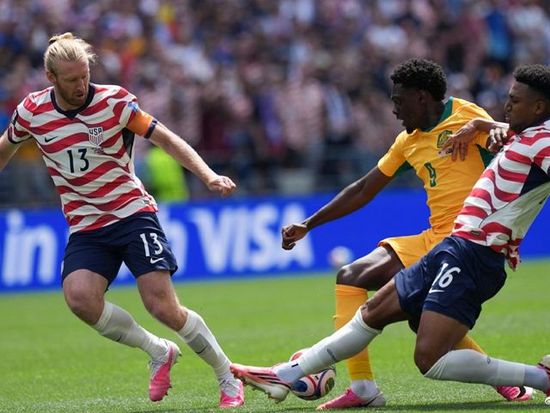 United States secures knockout-stage berth with 2-0 win over Australia