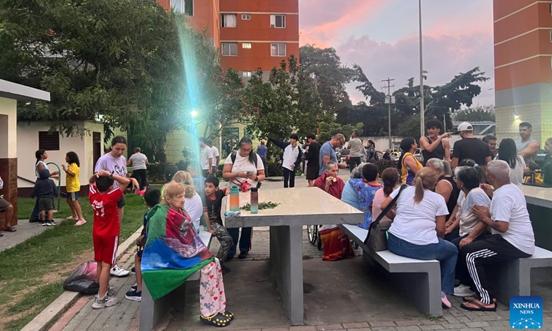This photo taken with a mobile phone shows people gathering in an open space after an earthquake in Caracas, Venezuela, June 24, 2026. Two powerful earthquakes, striking in rapid succession, hit Venezuela on Wednesday, causing buildings to collapse in the capital of Caracas. The U.S. Geological Survey (USGS) reported a magnitude 7.1 quake, followed just one minute later by an even stronger 7.5-magnitude tremor, with both hitting near the coastal town of Moron, about 160 km west of Caracas. (Photo: Xinhua)