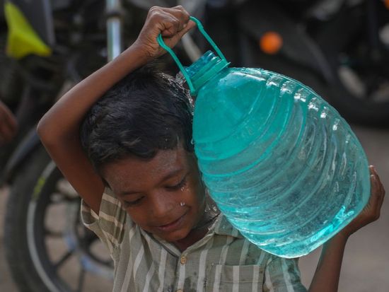 Delayed rains bring water shortages to cities and uncertainty to farms across India