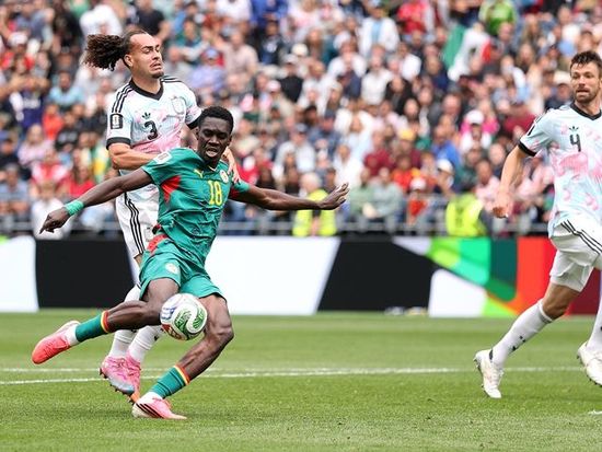 Belgium stuns Senegal with late comeback to reach last 16