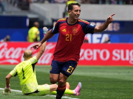 Oyarzabal double sends Spain into last 16