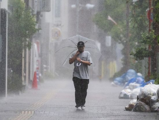 Heavy rain batters western Japan