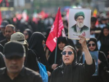 Procession held in Tehran to bid farewell to Iran's late supreme leader