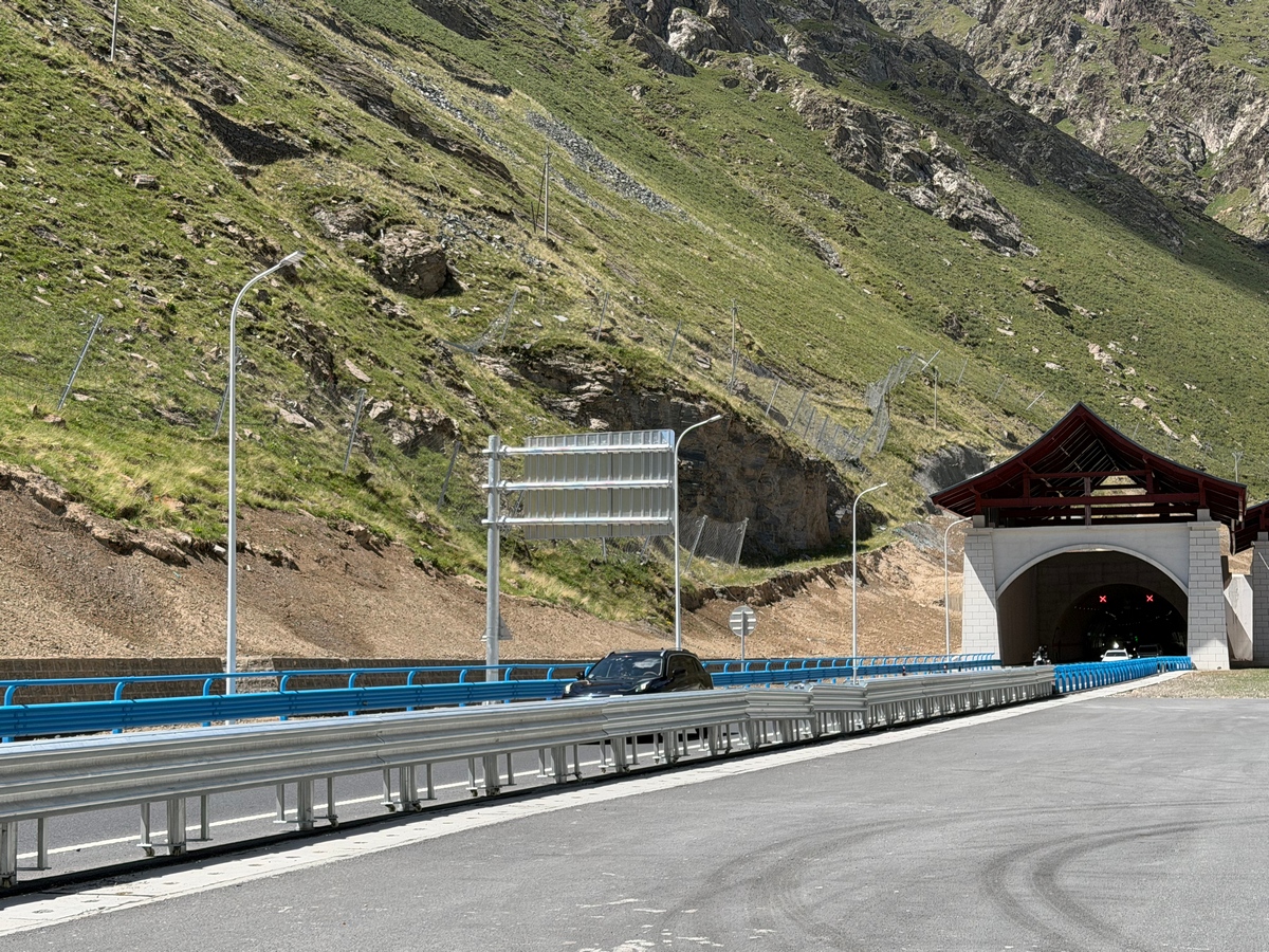 A car drives across the Tianshan Shengli Tunnel — the world's longest expressway tunnel, locates in the remote depths of the Tianshan Mountains, on July 4, 2026. Photo: Zhang Weilan/GT