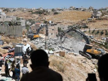 Israeli excavators demolish Palestinian houses in village of Deirat, West Bank