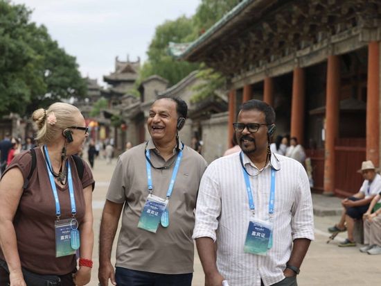 Intl content creators capture Shanxi's 1,400-year-old Yuci Ancient City