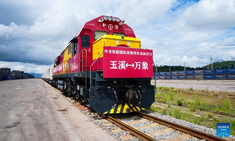 An international freight train bound for Lao capital Vientiane prepares to depart from Yanhe Station of China-Laos Railway in Yuxi City, southwest China's Yunnan Province, Aug. 23, 2025. The China-Laos Railway launched two-way operations of the international freight train service between Yuxi and Vientiane on Saturday. Since its inauguration in December 2021, the China-Laos Railway has transported over 64.5 million tonnes of goods by the end of July this year, including more than 14.9 million tonnes of cross-border cargo. (Xinhua/Chen Xinbo)