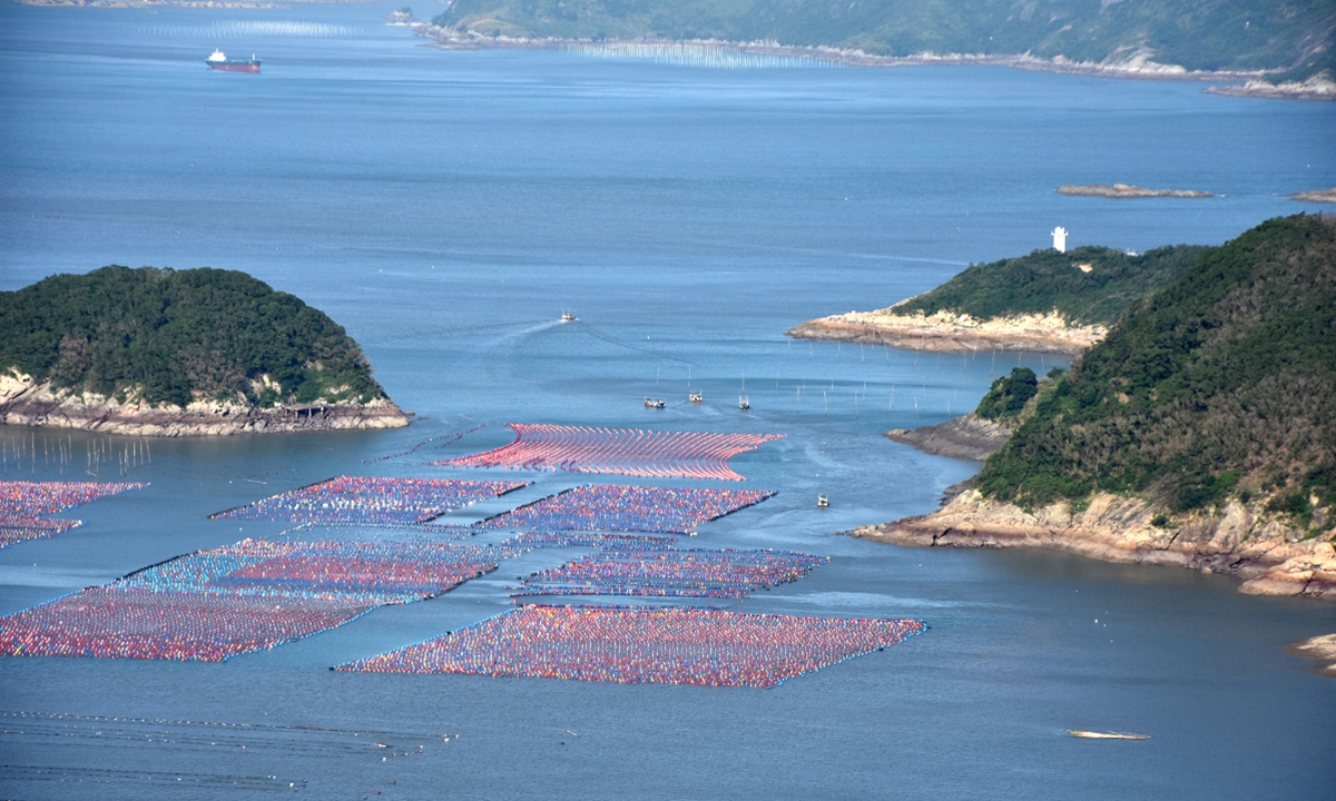 Fishermen carry out aquaculture activities in Xiapu county, East China's Fujian Province, on July 4, 2026. Photo: VCG
