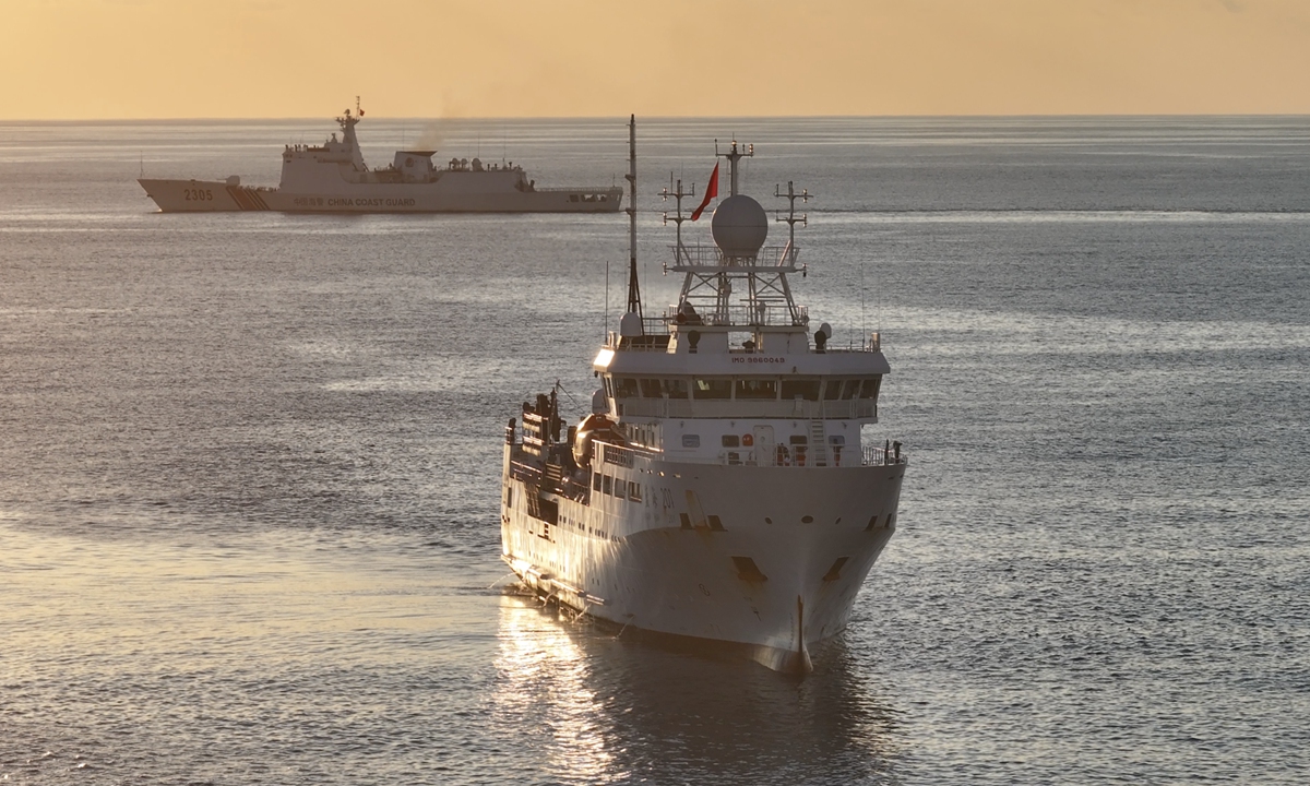 The Lanhai 201 scientific research vessel framed with the escorting China Coast Guard vessel 2305. Photo: Courtesy of Yao Yong