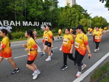 Malaysia's Sabah hosts run event to promote people-to-people exchanges with China