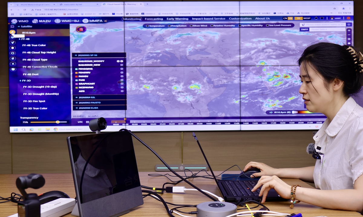Hua Wenli, an engineer at the World Meteorological Centre Beijing, operates the Cloud-Based Early Warning System of MAZU at the China Meteorological Administration on July 21, 2026. Photo: Lin Xiaoyi/GT