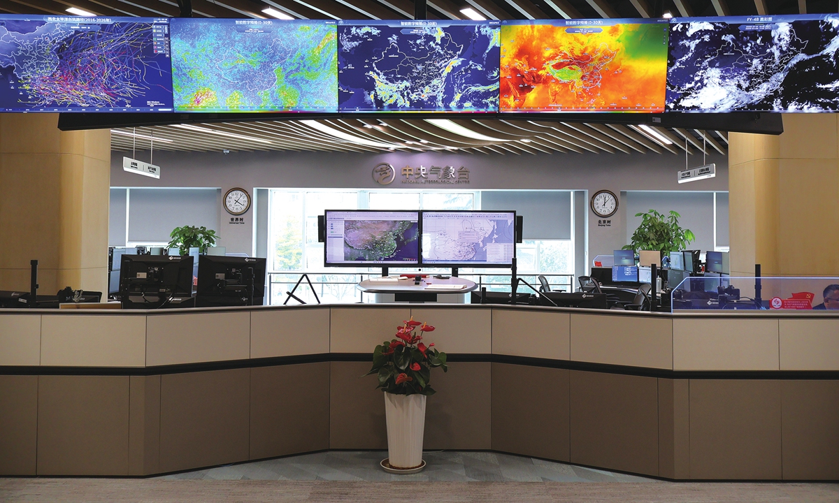 Real-time meteorological data is displayed on large screens at the National Meteorological Centre on July 21, 2026. Photo: Lin Xiaoyi/GT