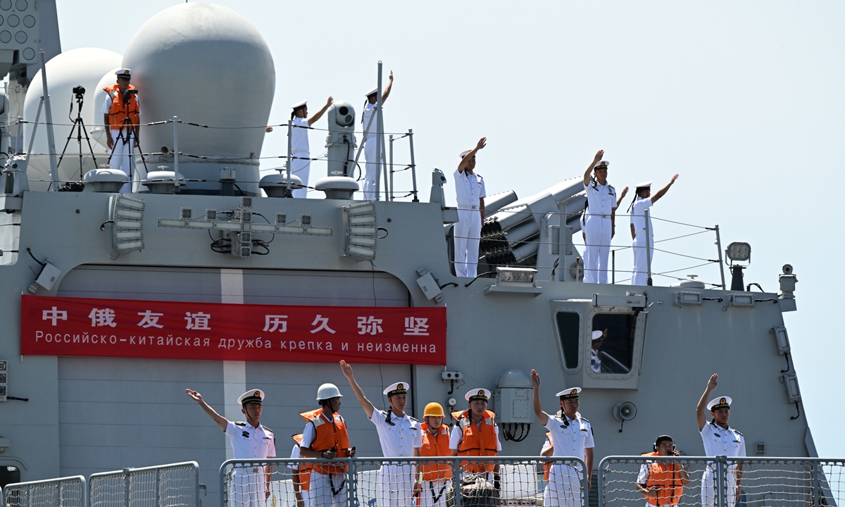 Crew members of the Chinese People's Liberation Army Navy guided-missile destroyer Kaifeng, after taking part in joint patrols with Russian Navy ships in the Pacific Ocean, stand on deck upon arrival at the port of Vladivostok, Russia. On July 28, 2026. The Russian and Chinese navies completed their sixth joint patrol in the Pacific Ocean, a mission that lasted two weeks. Photo: VCG