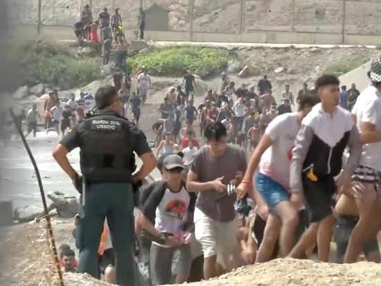 Spain reinforces Ceuta border as migrant surge leaves at least 9 dead