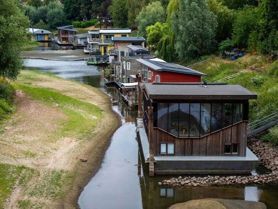 Dry, hot summers are putting Dutch dikes at risk and threatening German river trade