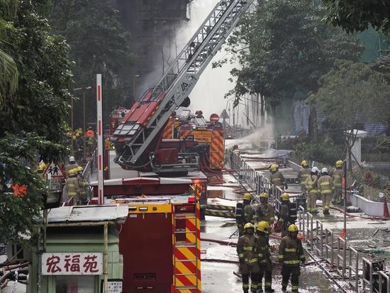 Hong Kong residential complex fire likely sparked by lit cigarette ends: report