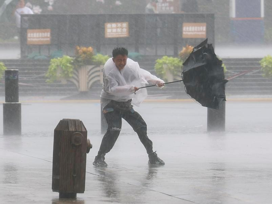 Hundreds of thousands evacuated as Typhoon Dolphin brings heavy rain to eastern China