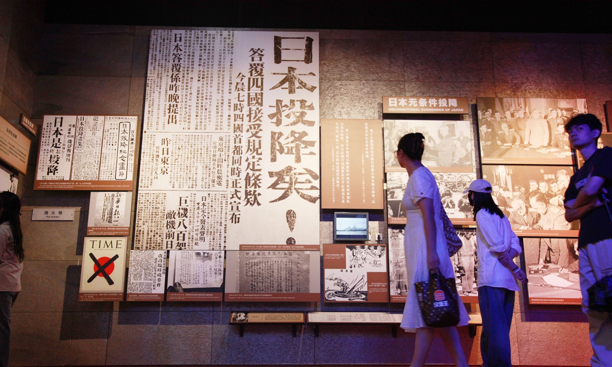 Visitors view exhibits at the exhibition Justice Will Prevail, Peace Will Prevail, the People Will Prevail—Exhibition on the Victory of the Anti-Fascist War in the China Theater and the Trial of Japanese War Criminals at the Memorial Hall of the Victims in Nanjing Massacre by Japanese Invaders in Nanjing, East China's Jiangsu Province on August 14, 2026. Photo: VCG