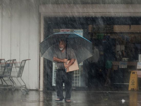 Lala is again a tropical storm, sending drenching rain and winds across the Hawaiian islands