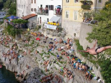 Traditional jumping event held in Kanal ob Soci, Slovenia