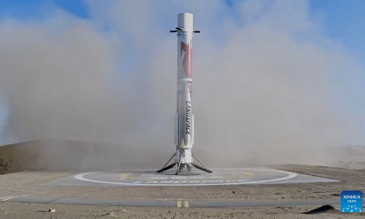 This screenshot from a video clip shows the first stage of the Zhuque-3 Y2 rocket successfully completing its land-based recovery, Aug. 19, 2026.