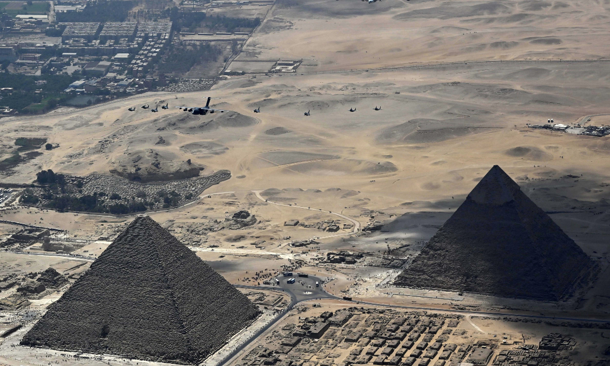 Some of the main warplanes participating in the China-Egypt Eagles of Civilization 2025 joint air force exercise form formation and fly over the Pyramids at very low altitudes in Cairo, Egypt on May 1, 2025. Photo: Courtesy of the Chinese People's Liberation Army (PLA) Air Force