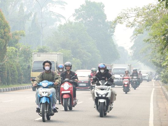 Indonesia warns against starting open blazes as haze from wildfires spreads to Malaysia