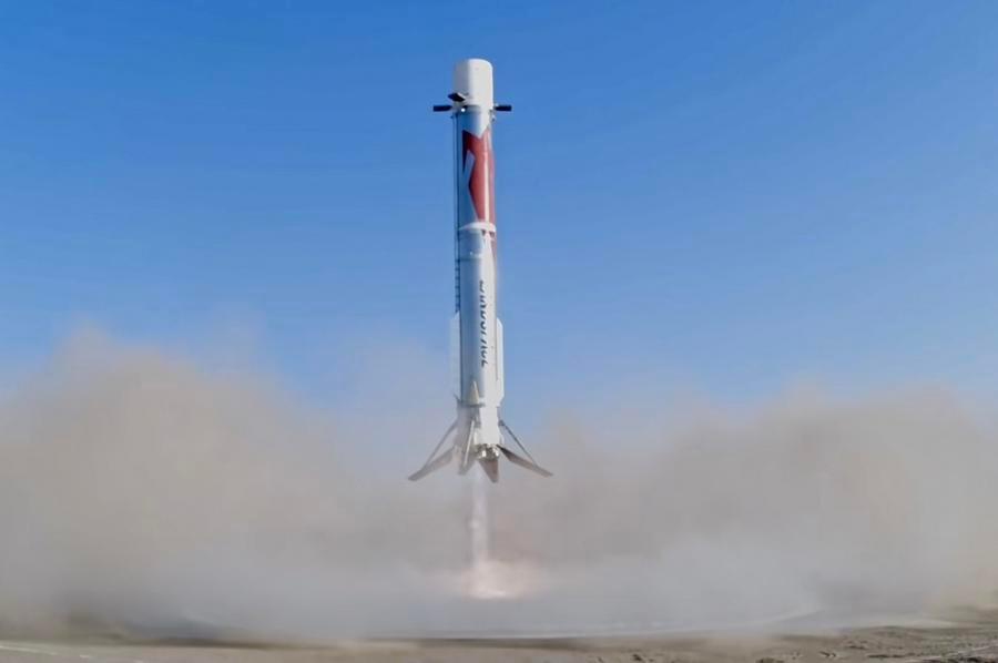 This screenshot from a video clip shows the first stage of the Zhuque-3 Y2 rocket making its land-based recovery, Aug. 19, 2026. (LandSpace/Handout via Xinhua)