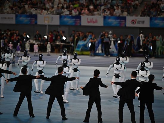 Robot archer lights up 'Zhixin' as 2nd World Humanoid Robot Games open in Beijing