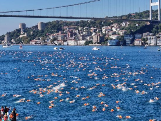 Where Europe meets Asia, over 2,000 swimmers take the plunge