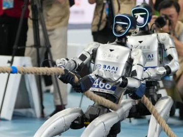 In pics: lightweight Tug of War of the 2nd World Humanoid Robot Games