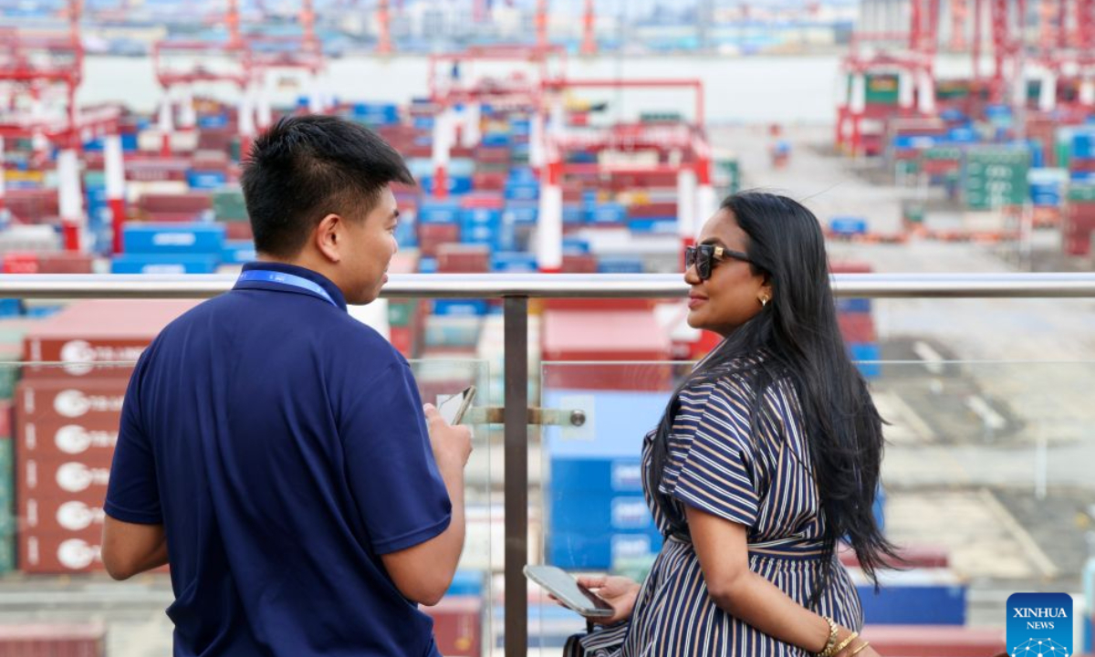 Guests visit Nansha Port Phase IV Container Terminal of Guangzhou Port in Guangzhou, south China's Guangdong Province, Sept. 3, 2026. (Xinhua/Lu Hanxin)