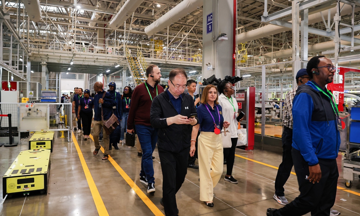 The international human rights experts group toured AVATR Digital Intelligence Factory of Changan Automobile in Chongqing on June 10, 2026. Photo: Chongqing Luhai International Communication Foundation