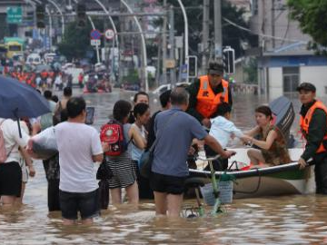 Stranded people rescued following torrential rains in Putian City, SE China's Fujian